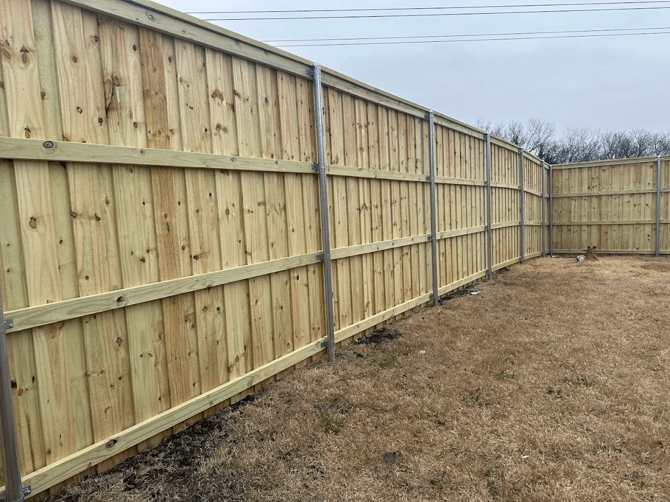 Privacy fence installation by Bulletproof Roofing