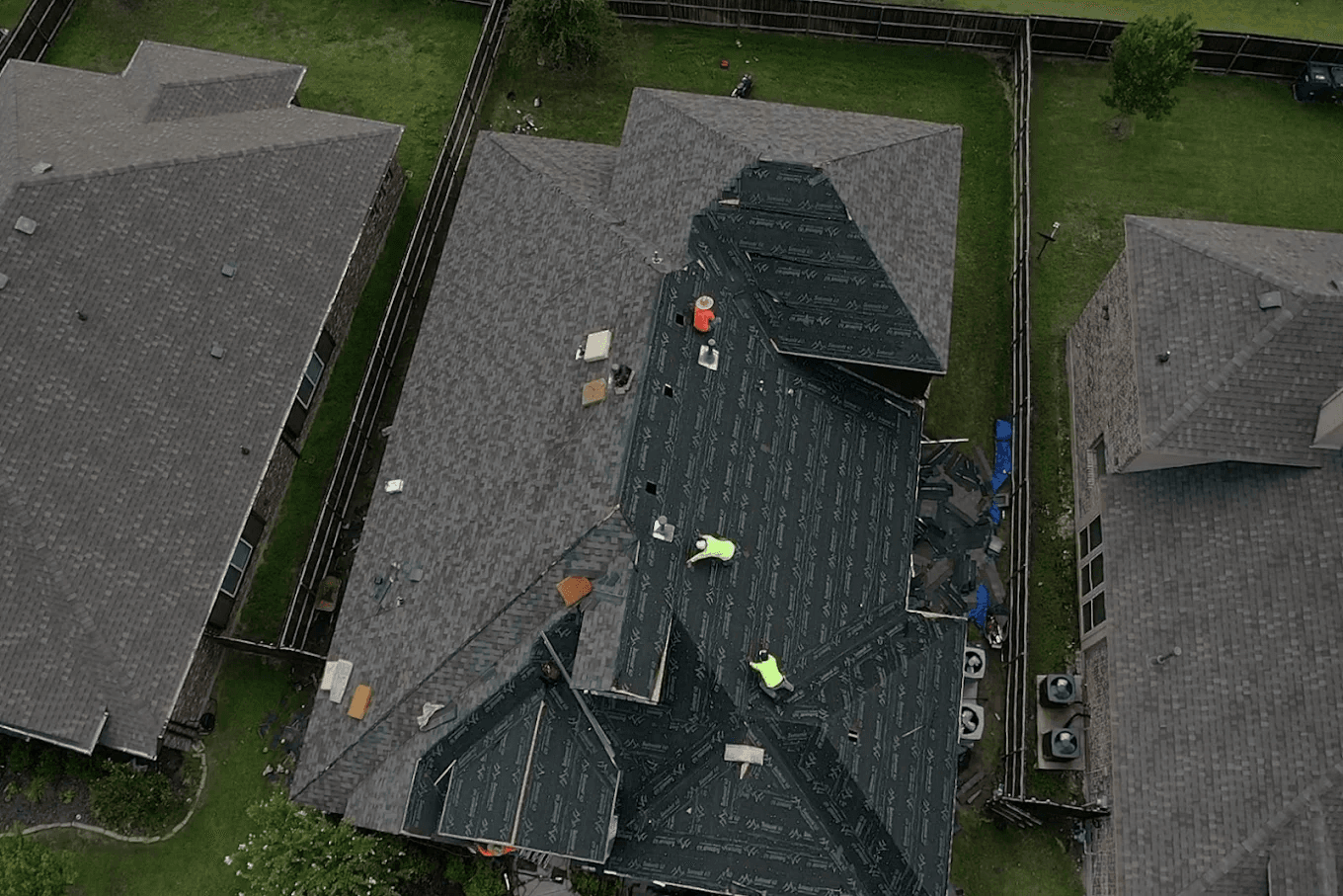 Roof installation in progress by Bulletproof Roofing team