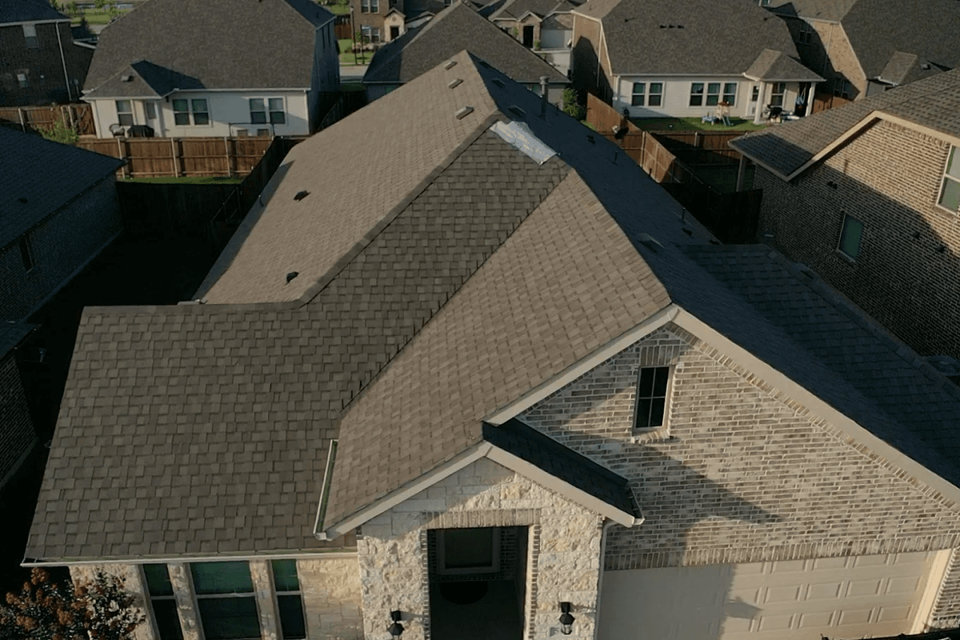 New architectural shingle roof installed on a home in the DFW area