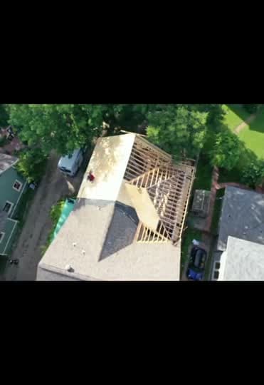 Drone footage of a full roof tear-off down to the decking